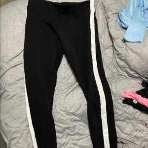 Black leggings with white stripe down the side